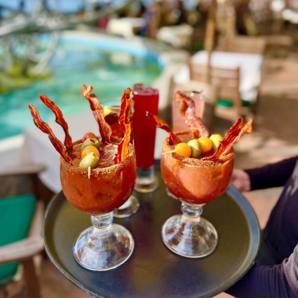 Bacon Bloody Mary Cocktails served in Schooner size glasses.