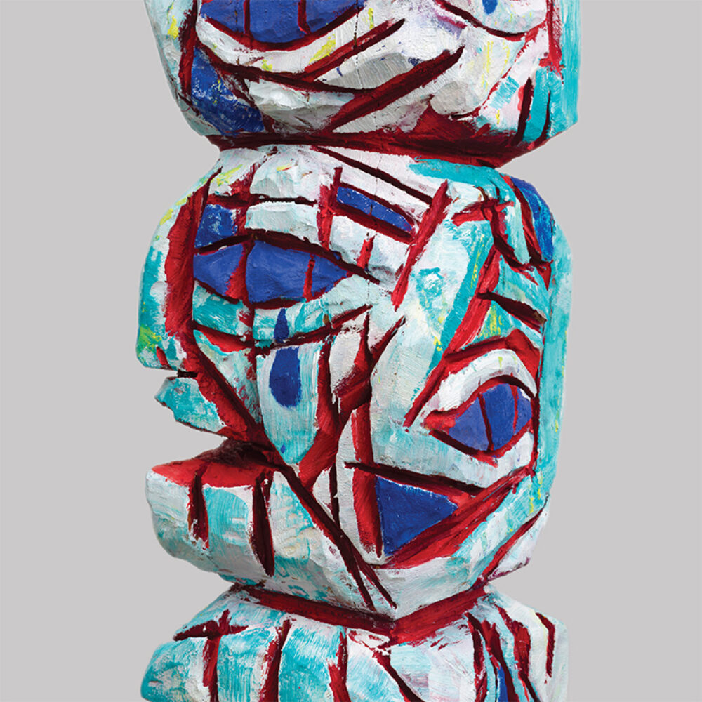 The poster features a detail of Ryan Schneider’s Jester, Fool, or Joker, a stacked figurative sculpture painted with bold red, blue, turquoise, and white abstract shapes against a light gray background.