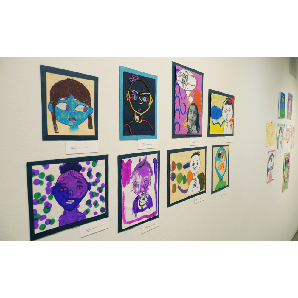 Colorful artwork by elementary school students displayed on the gallery walls of LBMA - John and Helen Apostle Foundation Youth Gallery