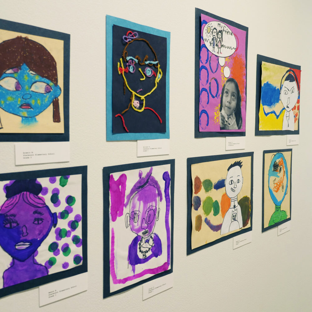 Colorful artwork by elementary school students displayed on the gallery walls of LBMA - John and Helen Apostle Foundation Youth Gallery